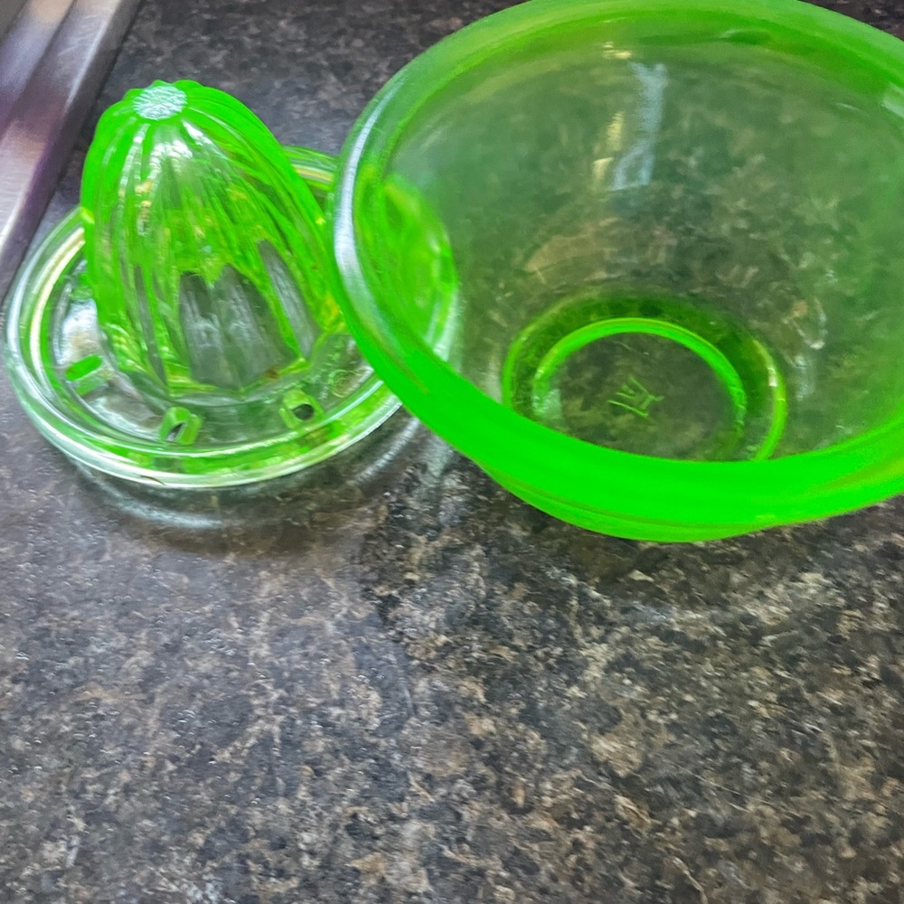 Vintage Uranium Glass juicer. Top and bottom